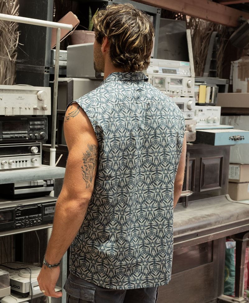 Feathral Sleeveless Button Up 