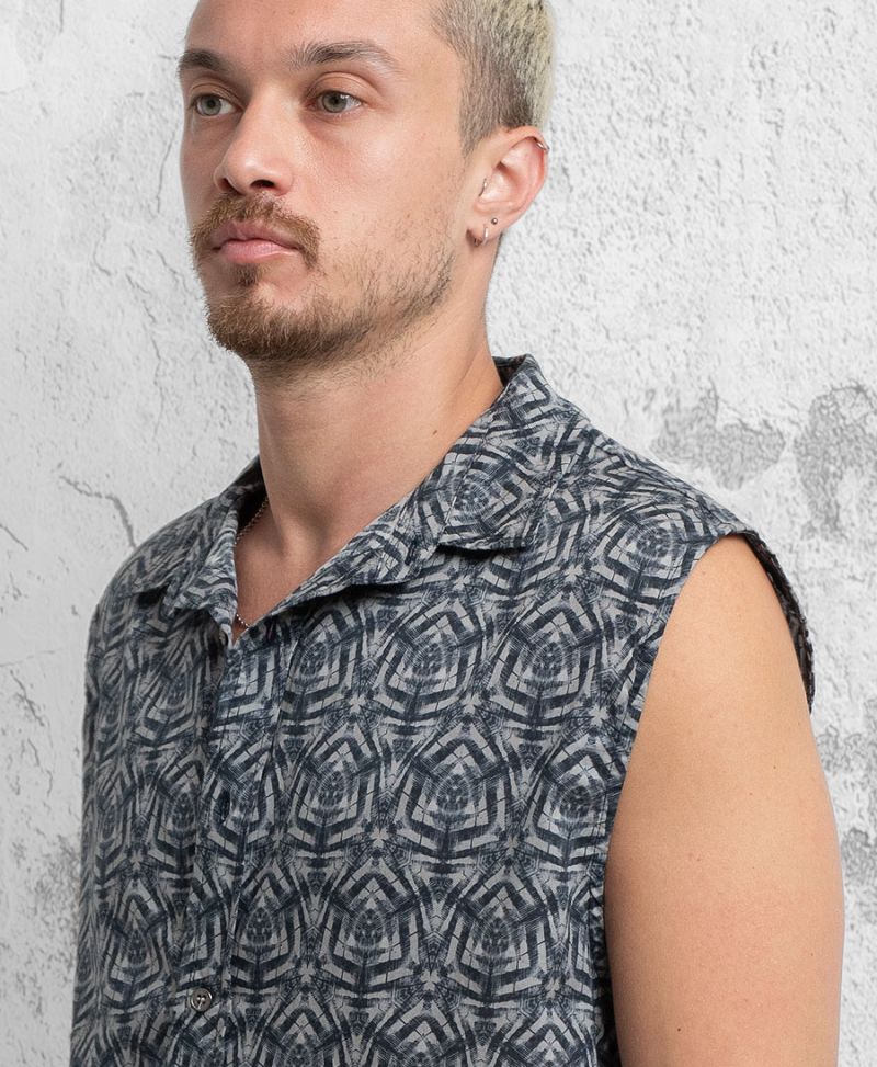 Feathral Sleeveless Button Up 