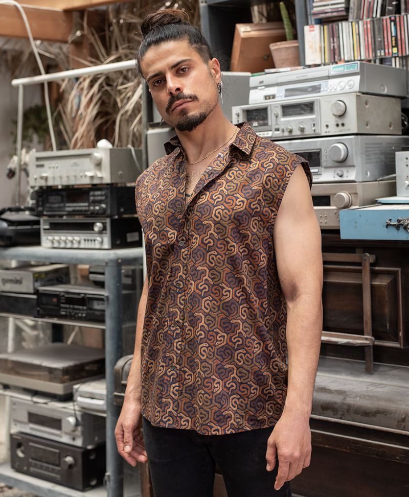 snake print sleeveless button up shirt