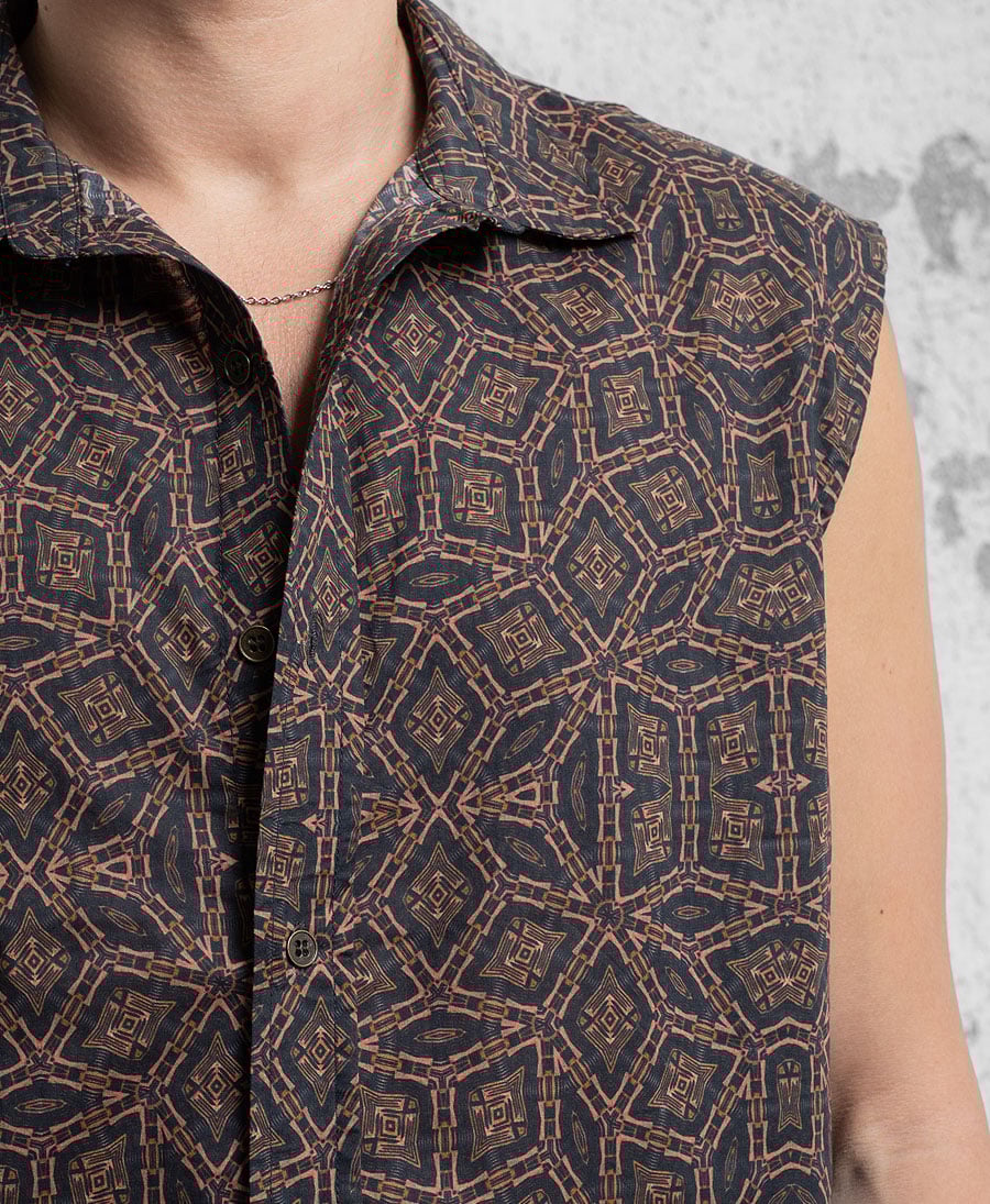 snake print sleeveless button up shirt