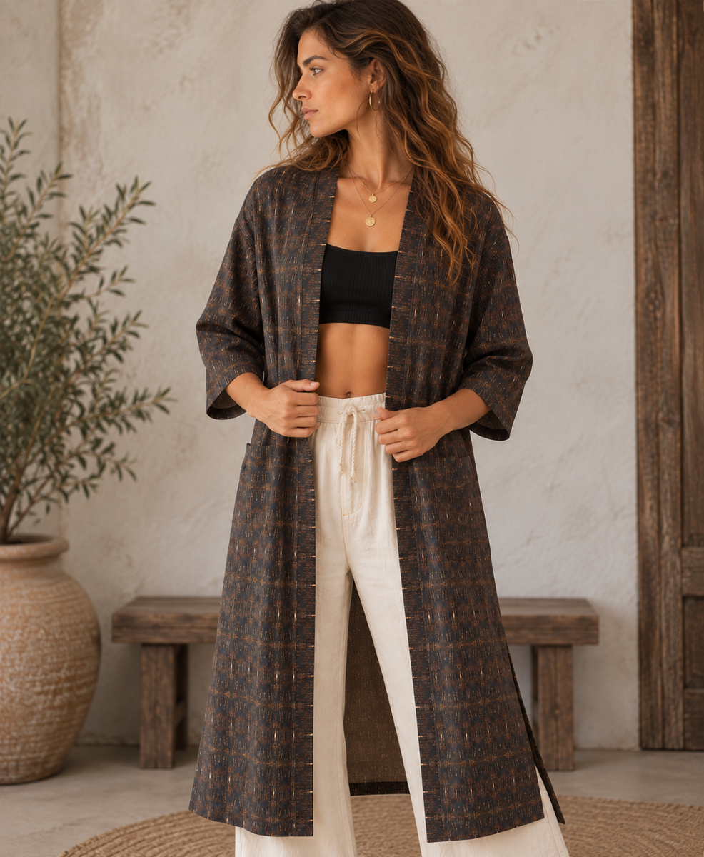 Woman wearing a long printed kimono as a night layer