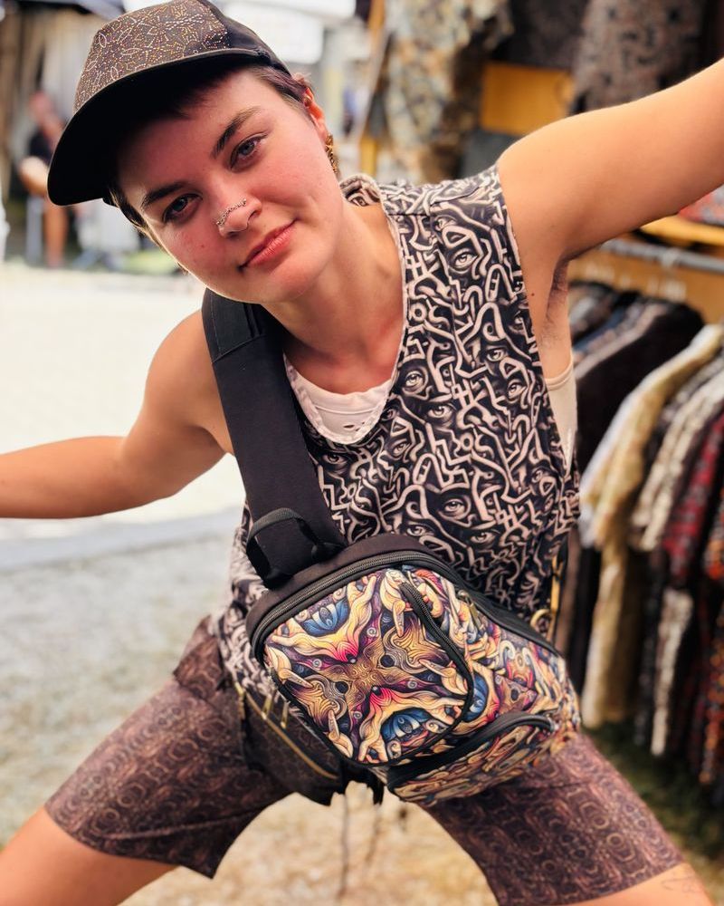 Festival goer at Ozora wearing a SOL printed pocket belt