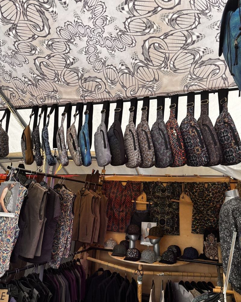 Printed pocket belts on display at the SOL festival booth