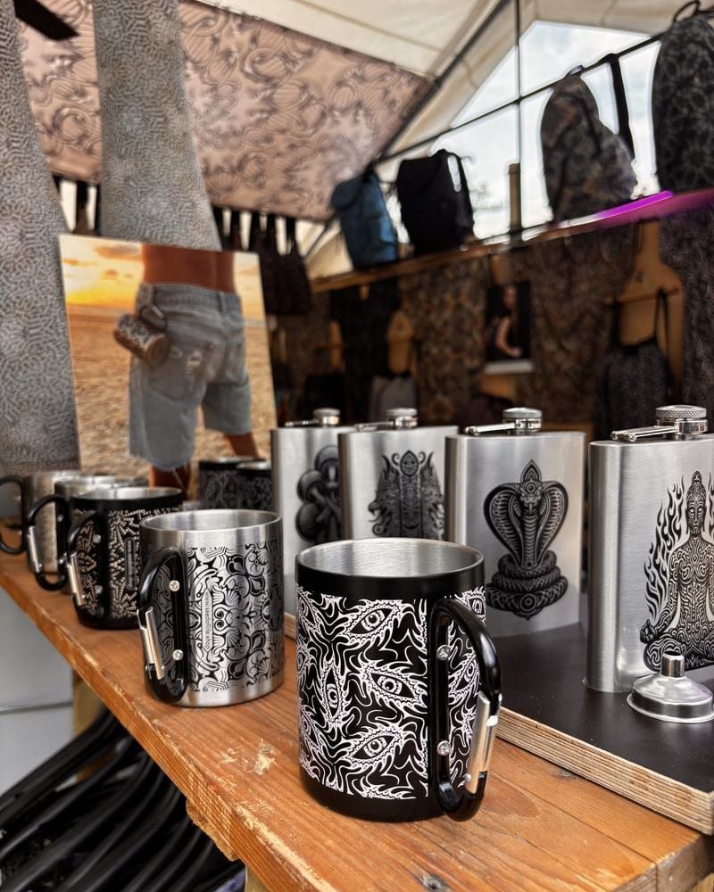 Printed stainless steel flasks and mugs at the SOL festival booth